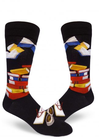 Stacks of red, yellow and blue books take flight on black book socks for men.