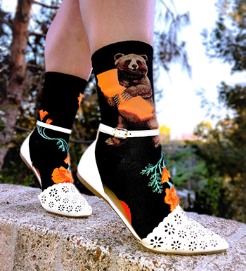 california-bear-socks-modsocks-novelty-sock-brand-wholesale California bear socks with a bear hugging the state of CA and California poppy flowers by ModSocks.