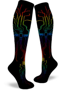 Rainbow circuitry branches across a black background on these sleekly geeky women's knee socks.