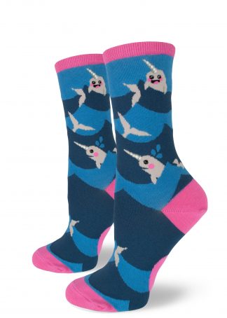 Narwhal socks feature the cute creatures swimming in an ocean of blue waves, tipped in pink at the heel, toe and cuff.