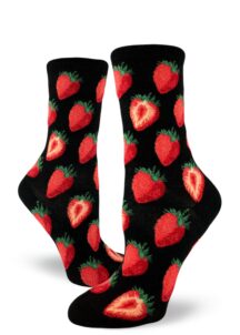 Sweet strawberries make up this black women's crew sock.