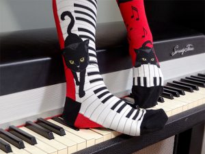 Piano cat socks by ModSocks in red knee high socks for pianists and cat lovers.
