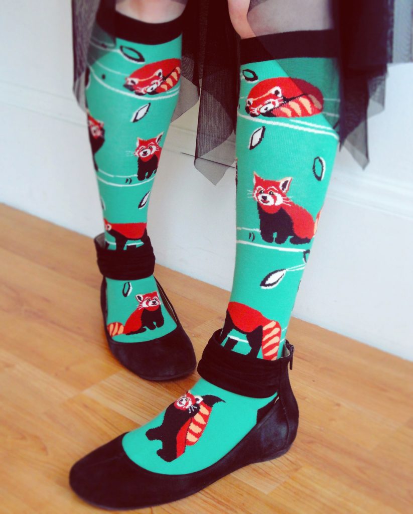 Red panda socks by ModSocks are a playful knee high sock style.