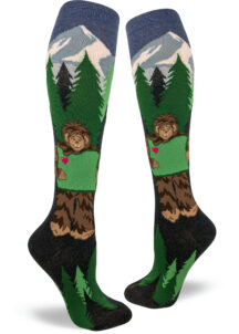 Sasquatch holds Oregon State knee socks by ModSocks.