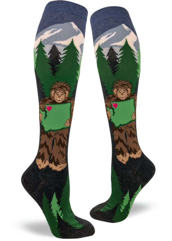 Sasquatch holds Washington State knee socks by ModSocks.