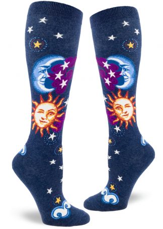 Celestial knee socks with a sun, moon and star design on a heather navy background.