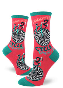 Red cycling socks say "Committed Cycle Therapy" with a teal bicycle with optical illusion spinning wheel.