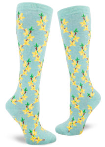 Forsythia blossom knee socks with a yellow floral design on a heather aqua background.
