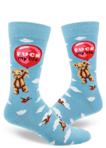 A teddy bear is carried away by a big red balloon that says "Fuck my life" while birds swoop through the cloud-filled sky blue background of these men's crew socks.