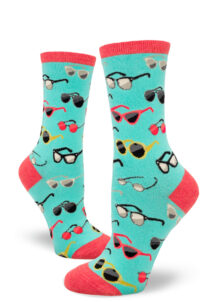 Aqua socks with a pattern of retro eyeglasses and sunglasses.