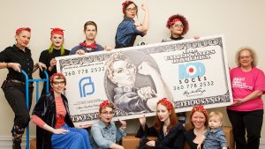ModSocks presents Mt. Baker Planned Parenthood with $25,000, the proceeds from sales of their Nasty Rosie Socks.