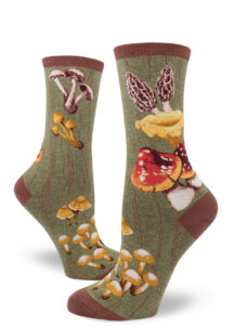 Green woodgrain socks with red, yellow and taupe mushrooms and toadstools.