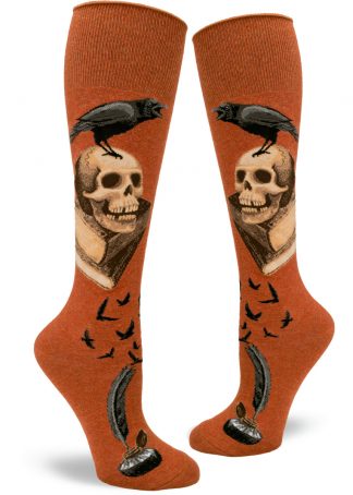 Poe-inspired knee socks with a raven on a skull on a stack of old books.
