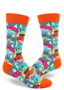 Colorful socks for men featuring a pop-art style repeating cat portrait pattern in orange, magenta, aqua, yellow, blue and white.