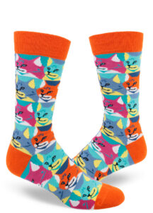Colorful socks for men featuring a pop-art style repeating cat portrait pattern in orange, magenta, aqua, yellow, blue and white.
