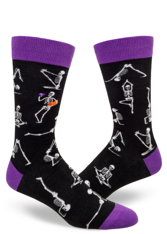 Men's socks depicting skeletons in yoga poses.