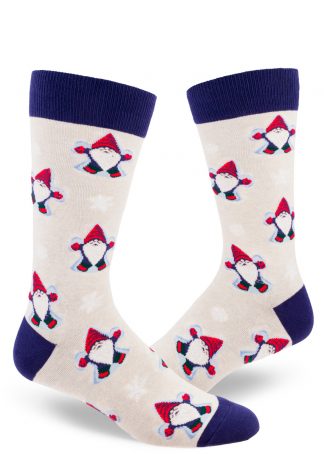 Gnomes dressed in red caps, mittens and boots make snow angels on these festive men's crew socks with a heather cream background.