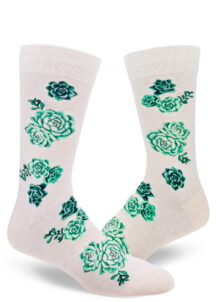 Men's crew socks with a design of green, purple and pink succulent plants on a heather cream background.