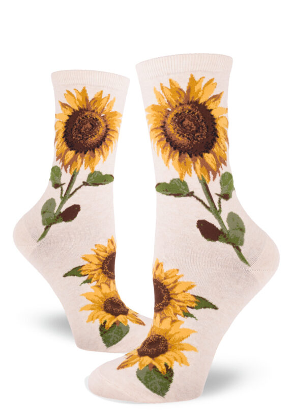 Sunflower socks for women with a yellow and green floral design on a cream background.