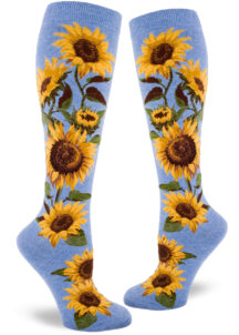 Sunflower knee socks with a yellow and green floral design on a blue background.