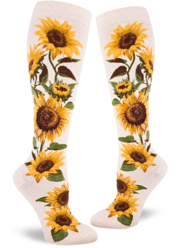 Sunflower knee socks with a yellow and green floral design on a cream background.