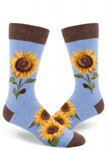 Men's sunflower socks with a yellow and green floral design on a blue background.