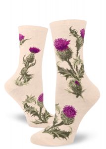 Floral crew socks in heather cream with a thistle motif in purple and green.