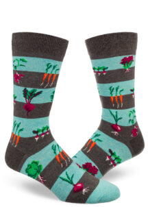 Striped men's socks in brown and aqua with a pattern of garden vegetables.